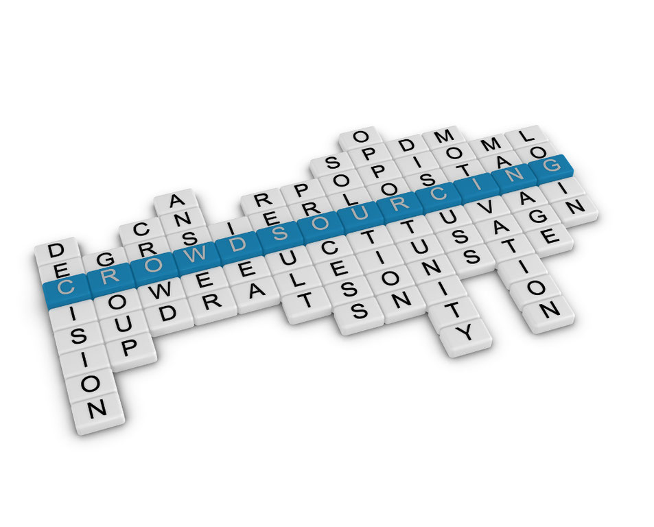 A crossword puzzle style arrangement of scrabble-like letters that spell crowdsourcing on the horizontal using one letter from each of the vertical words